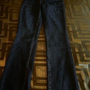 Blue Flare Wide Leg Jeans with Modern Distressing